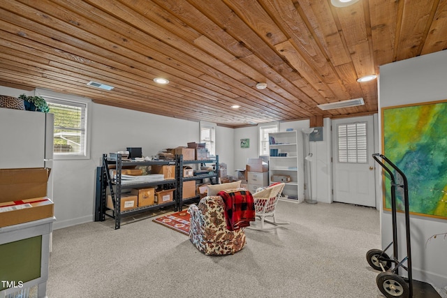 recreation room featuring carpet flooring and wood ceiling