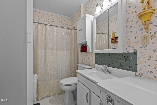 bathroom featuring a shower with curtain, vanity, toilet, and crown molding