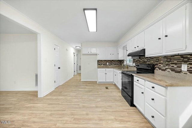 kitchen featuring white cabinets, light hardwood / wood-style floors, sink, and black range with electric cooktop