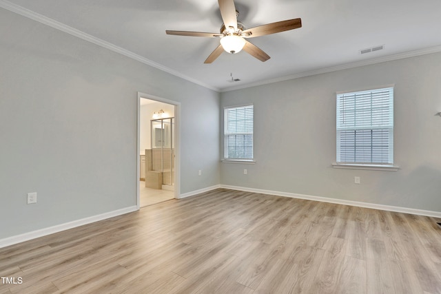 empty room with crown molding, light hardwood / wood-style flooring, and ceiling fan