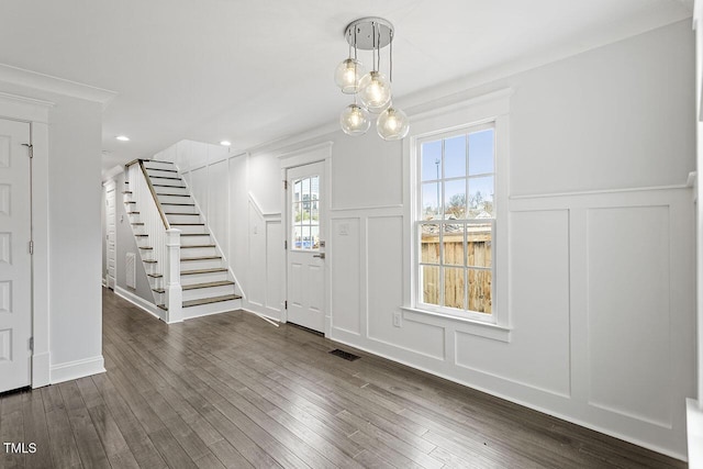 foyer featuring dark hardwood / wood-style floors