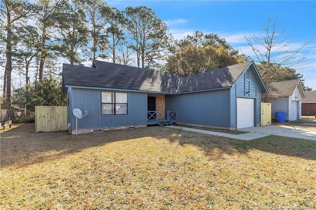 view of front of house featuring crawl space, an attached garage, concrete driveway, and a front lawn