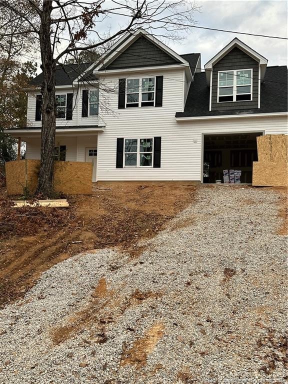 front facade with a garage