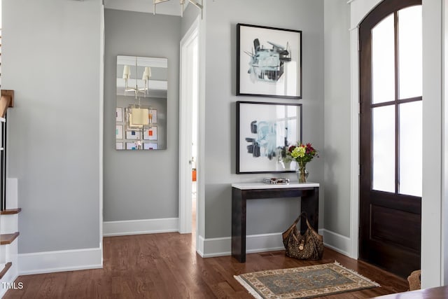 entrance foyer featuring dark wood-type flooring