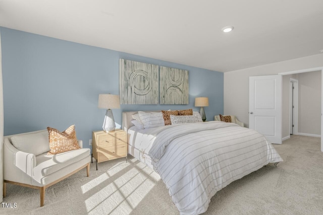 bedroom with light colored carpet