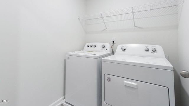 laundry area with washer and dryer