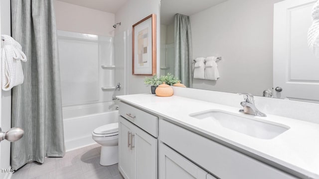 full bathroom featuring vanity, shower / bath combo, and toilet