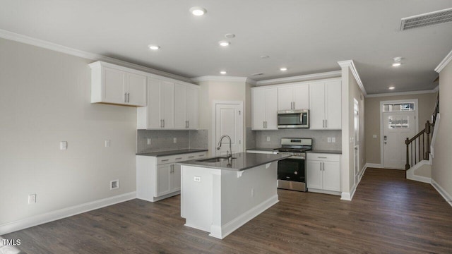 1825 Hinesley Dr, Durham, NC 27703 - kitchen with appliances with stainless steel finishes, ornamental molding, a sink, dark countertops, and decorative backsplash