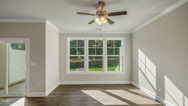 1825 Hinesley Dr, Durham, NC 27703 - spare room featuring dark wood-style flooring, ceiling fan, baseboards, and crown molding
