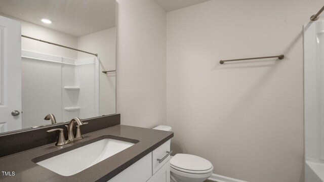 1825 Hinesley Dr, Durham, NC 27703 - full bath with toilet, a shower, vanity, and recessed lighting