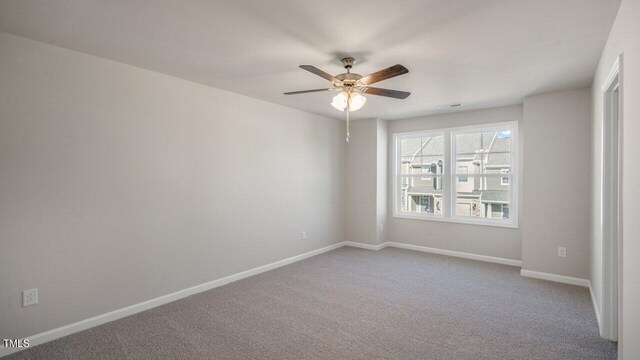 1825 Hinesley Dr, Durham, NC 27703 - unfurnished room with ceiling fan, baseboards, and carpet floors