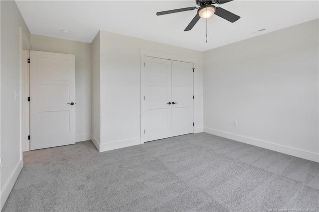3727 Gainey Rd, Fayetteville, NC 28306 - unfurnished bedroom featuring carpet, baseboards, a closet, and a ceiling fan