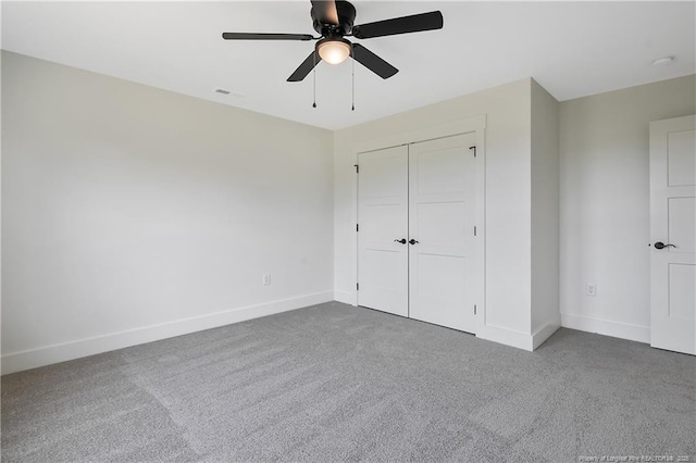 3727 Gainey Rd, Fayetteville, NC 28306 - unfurnished bedroom with carpet floors, baseboards, a closet, and ceiling fan