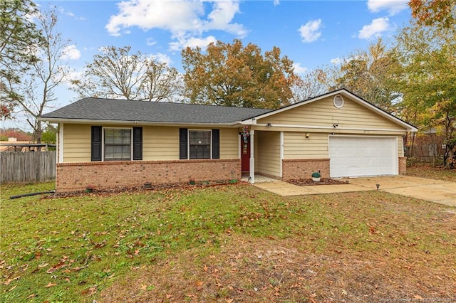 ranch-style home featuring a garage and a front lawn