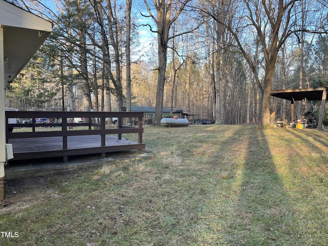 view of yard featuring a deck