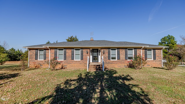 single story home with a front yard