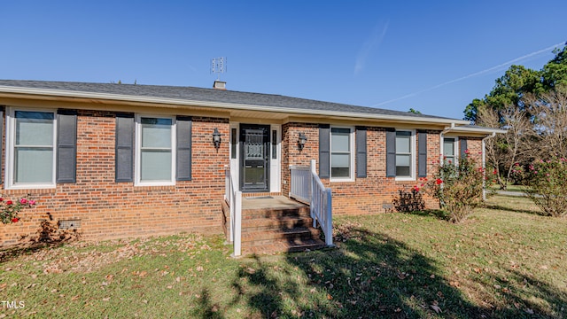 view of front of home with a front lawn