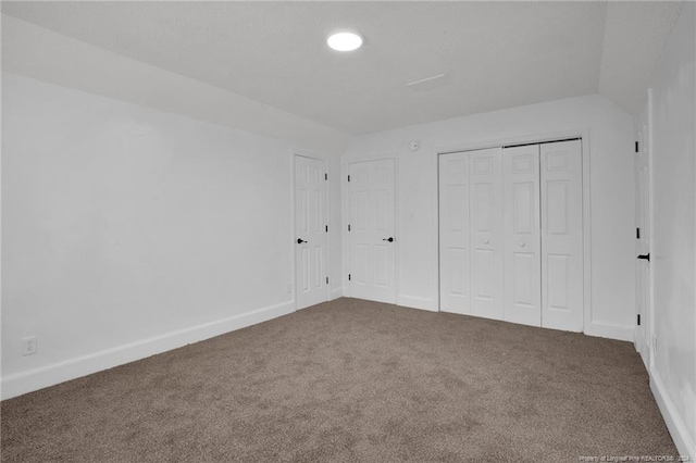 unfurnished bedroom with carpet flooring