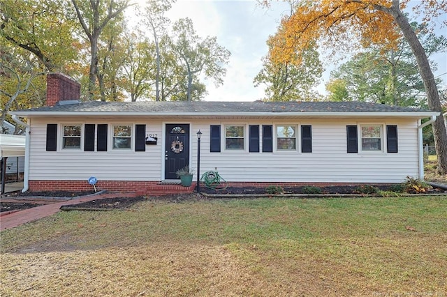 ranch-style home with a front yard