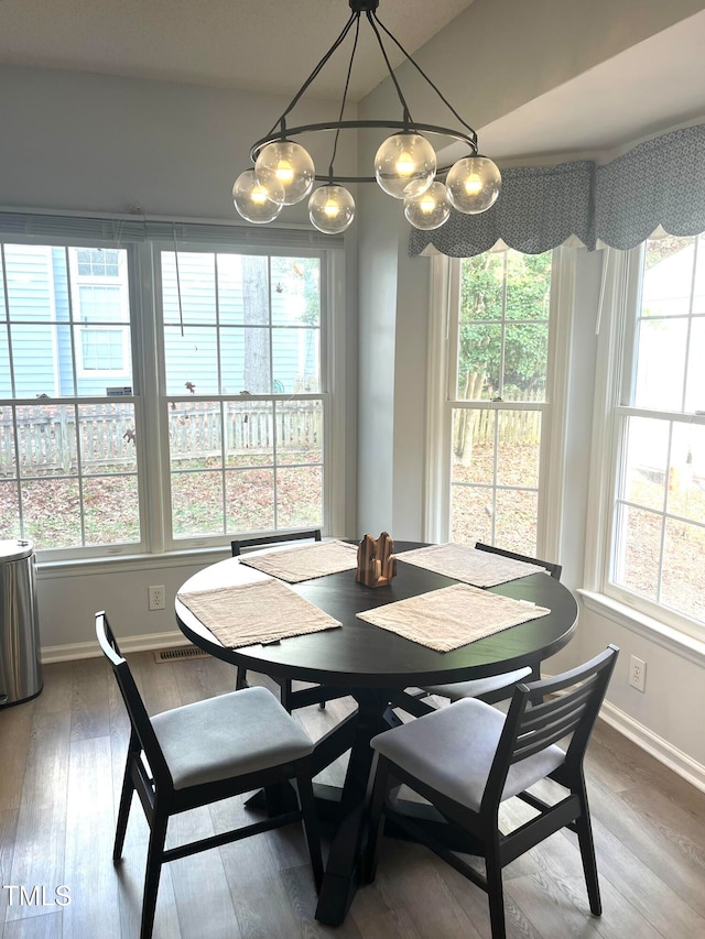 dining area featuring hardwood / wood-style flooring