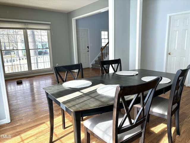 dining room featuring light hardwood / wood-style floors