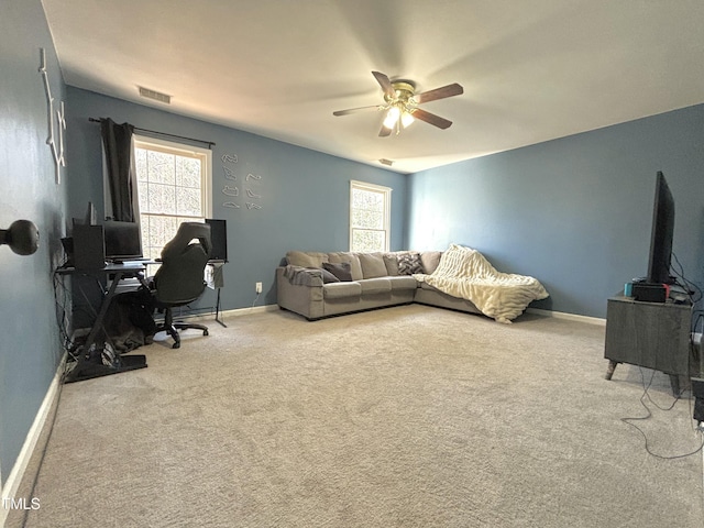 office area featuring carpet flooring and ceiling fan