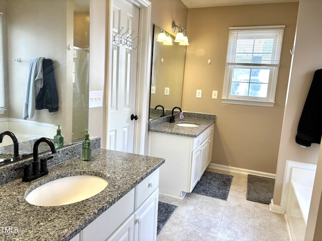 bathroom featuring tile patterned floors, vanity, and shower with separate bathtub