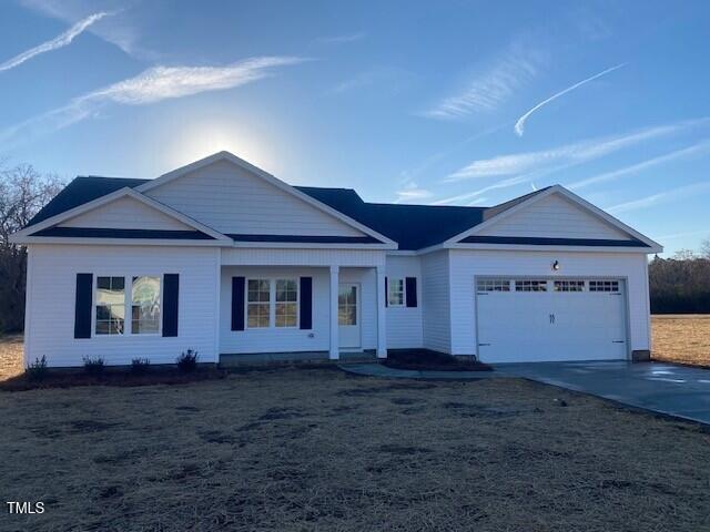 single story home featuring a garage