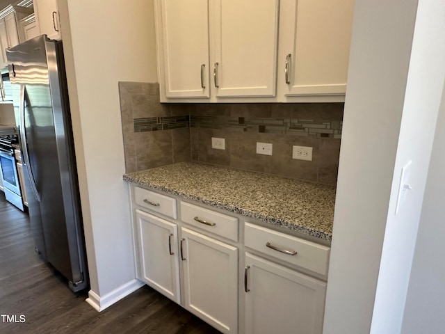 kitchen with white cabinetry and dark wood-type flooring