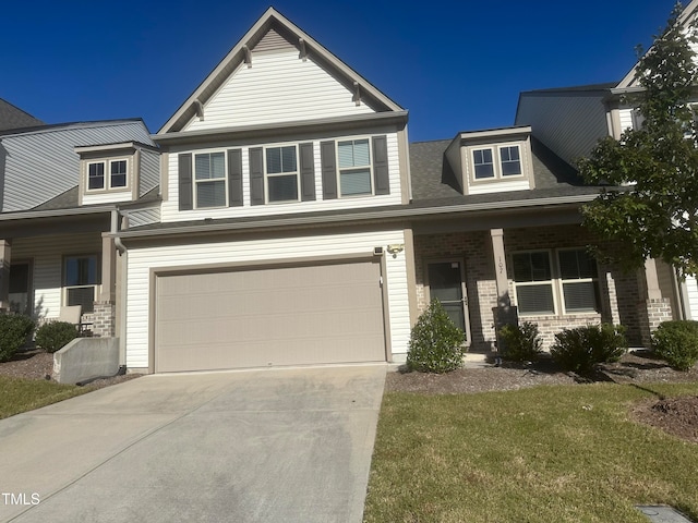 view of front facade with a front lawn and a garage