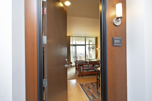 corridor featuring hardwood / wood-style flooring