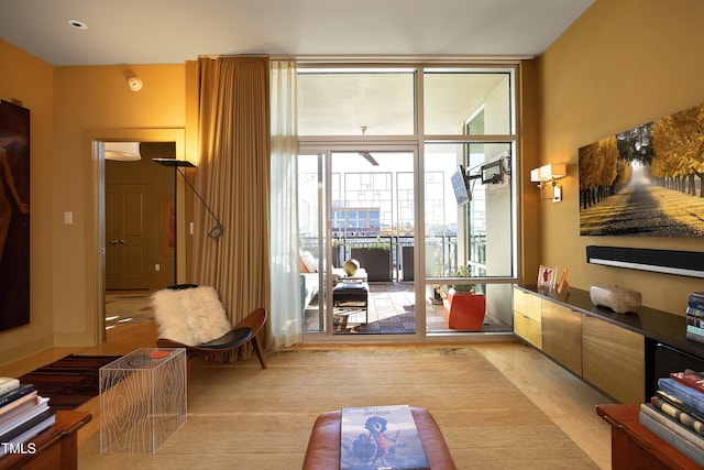 sitting room with light wood-type flooring