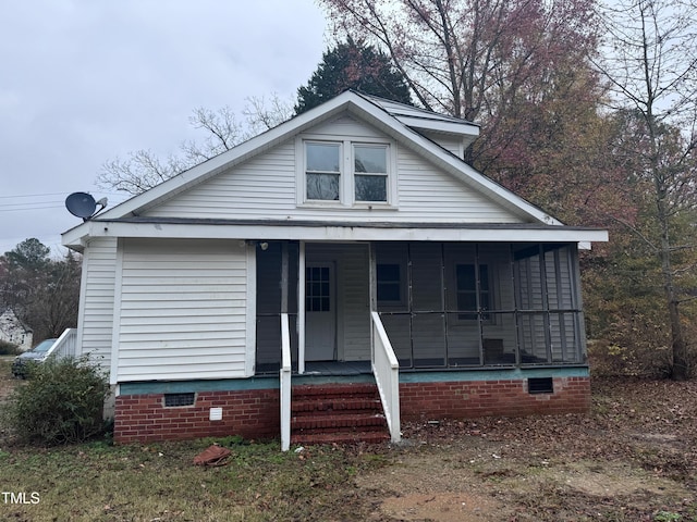 bungalow featuring covered porch