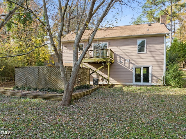 back of property featuring a deck