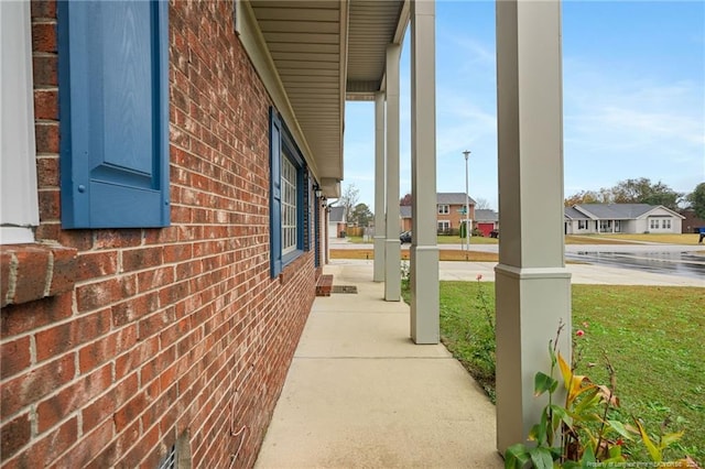 view of home's exterior featuring covered porch