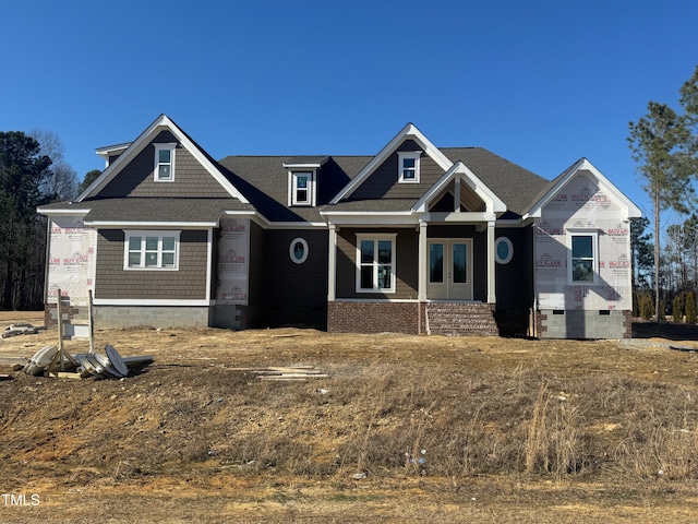 unfinished property featuring french doors