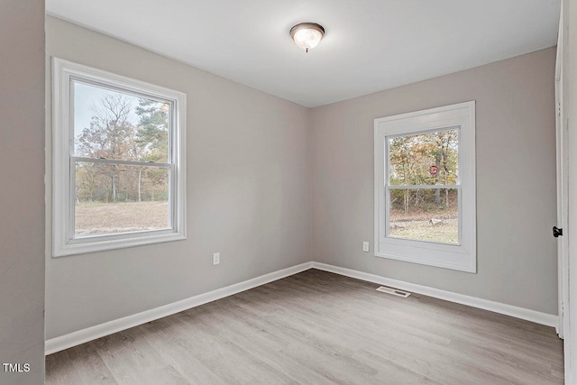 empty room featuring light hardwood / wood-style floors