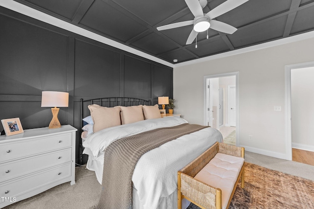 bedroom with light colored carpet, ceiling fan, and ensuite bathroom