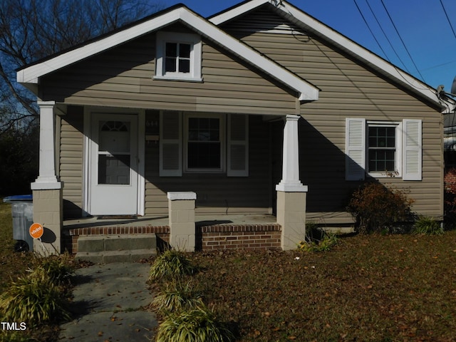 bungalow-style home featuring covered porch