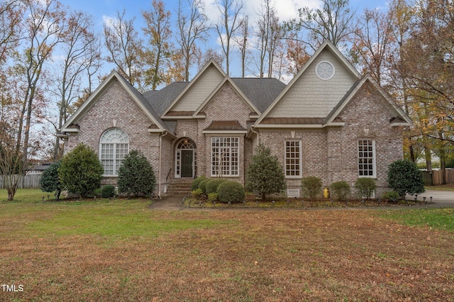 view of front of property with a front lawn