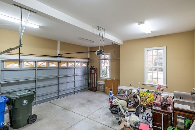 garage featuring a garage door opener