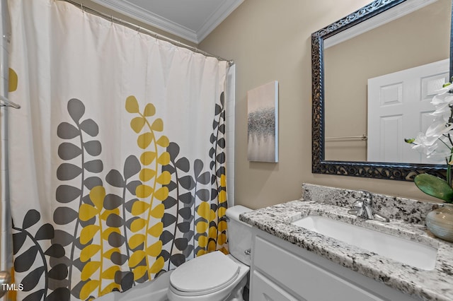 bathroom featuring toilet, vanity, and ornamental molding