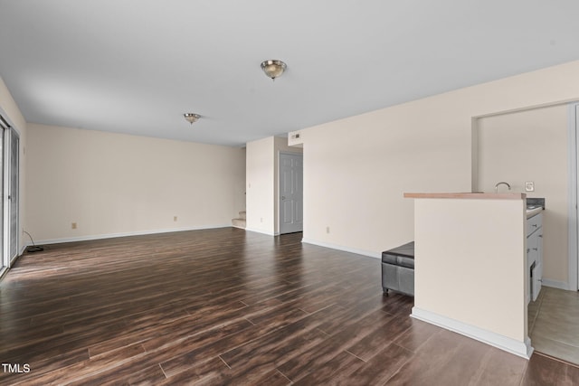 living room with dark hardwood / wood-style floors