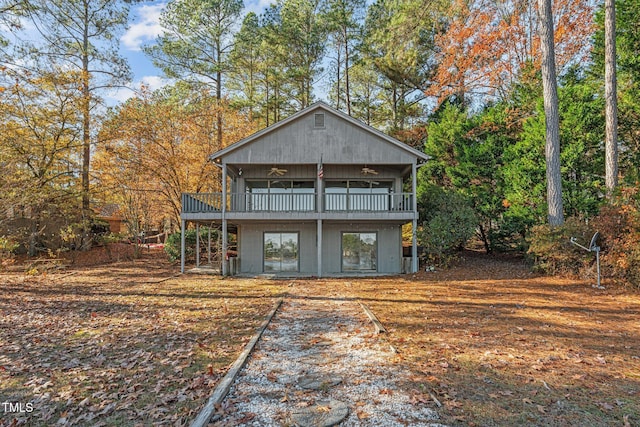 rear view of house with a deck