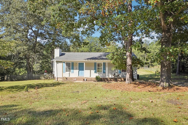 ranch-style house featuring a porch and a front lawn