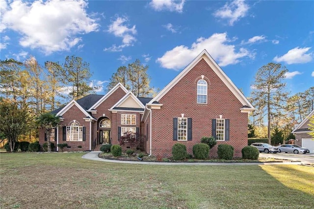 view of property with a front lawn