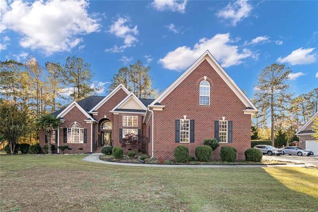 363 Kimberwicke Dr, Fayetteville, NC 28311 - view of front of home featuring brick siding and a front lawn