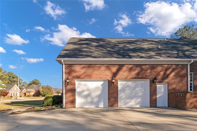 363 Kimberwicke Dr, Fayetteville, NC 28311 - garage featuring concrete driveway