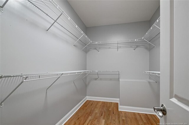 363 Kimberwicke Dr, Fayetteville, NC 28311 - spacious closet featuring wood finished floors