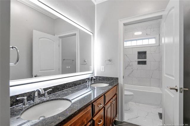 full bathroom with vanity, toilet, and tiled shower / bath combo